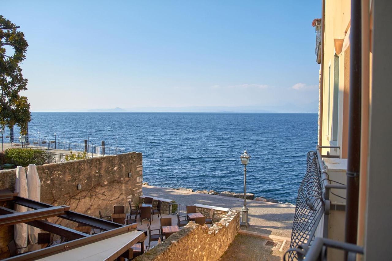 Apartmentsgarda - Residenza Dei Navigatori ตอร์รีเดลเบนาโก ภายนอก รูปภาพ