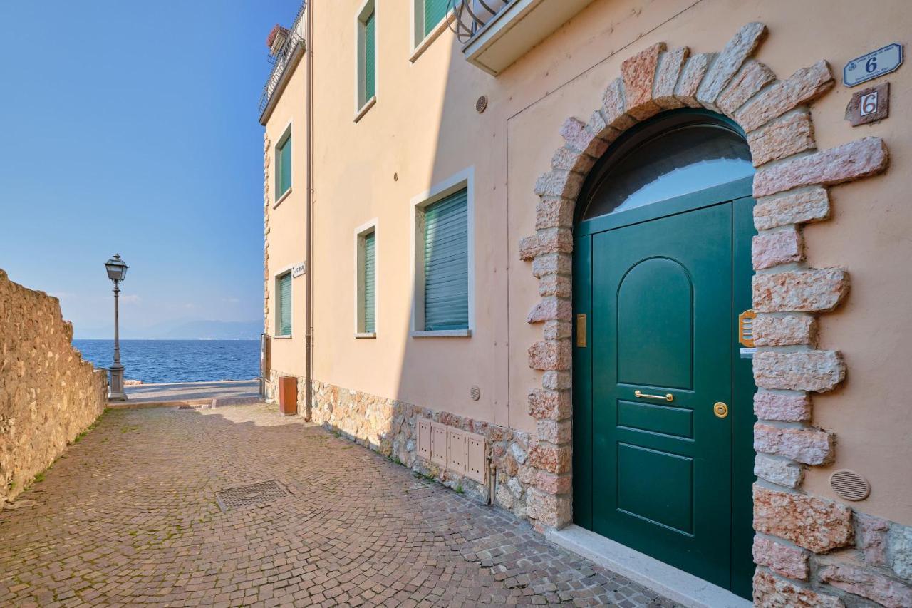 Apartmentsgarda - Residenza Dei Navigatori ตอร์รีเดลเบนาโก ภายนอก รูปภาพ