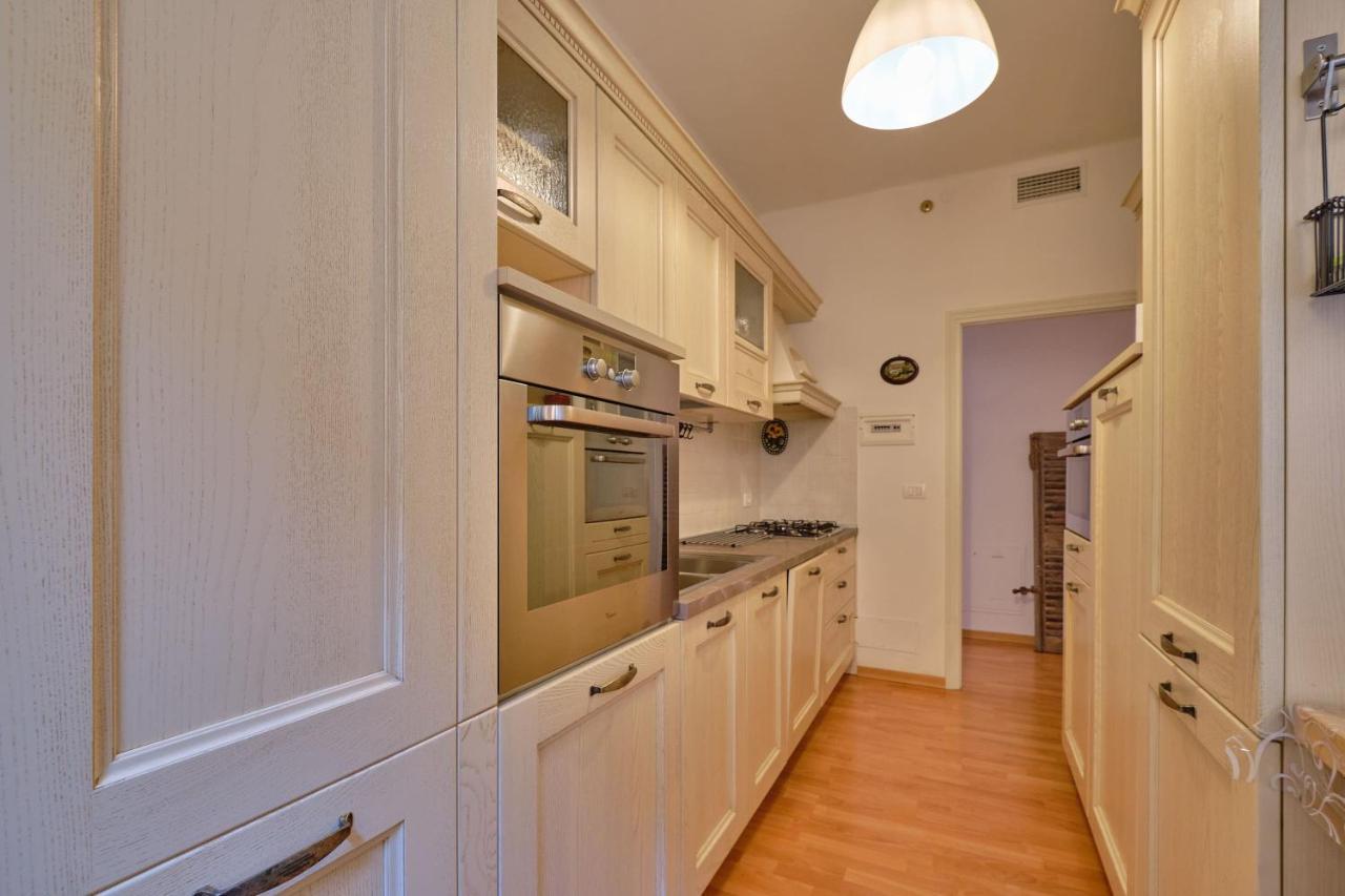 Apartmentsgarda - Residenza Dei Navigatori ตอร์รีเดลเบนาโก ภายนอก รูปภาพ